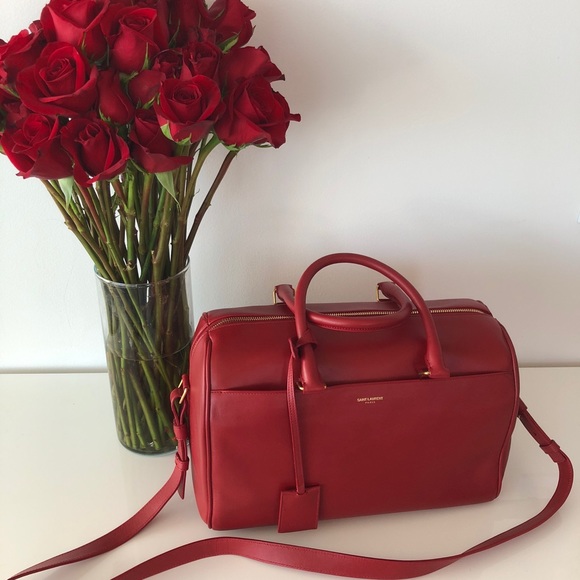 Yves Saint Laurent Handbags - SOLD! Saint Laurent duffle bag